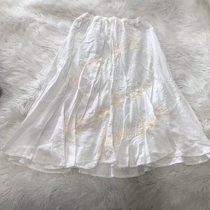 Lined white and yellow flowy skirt